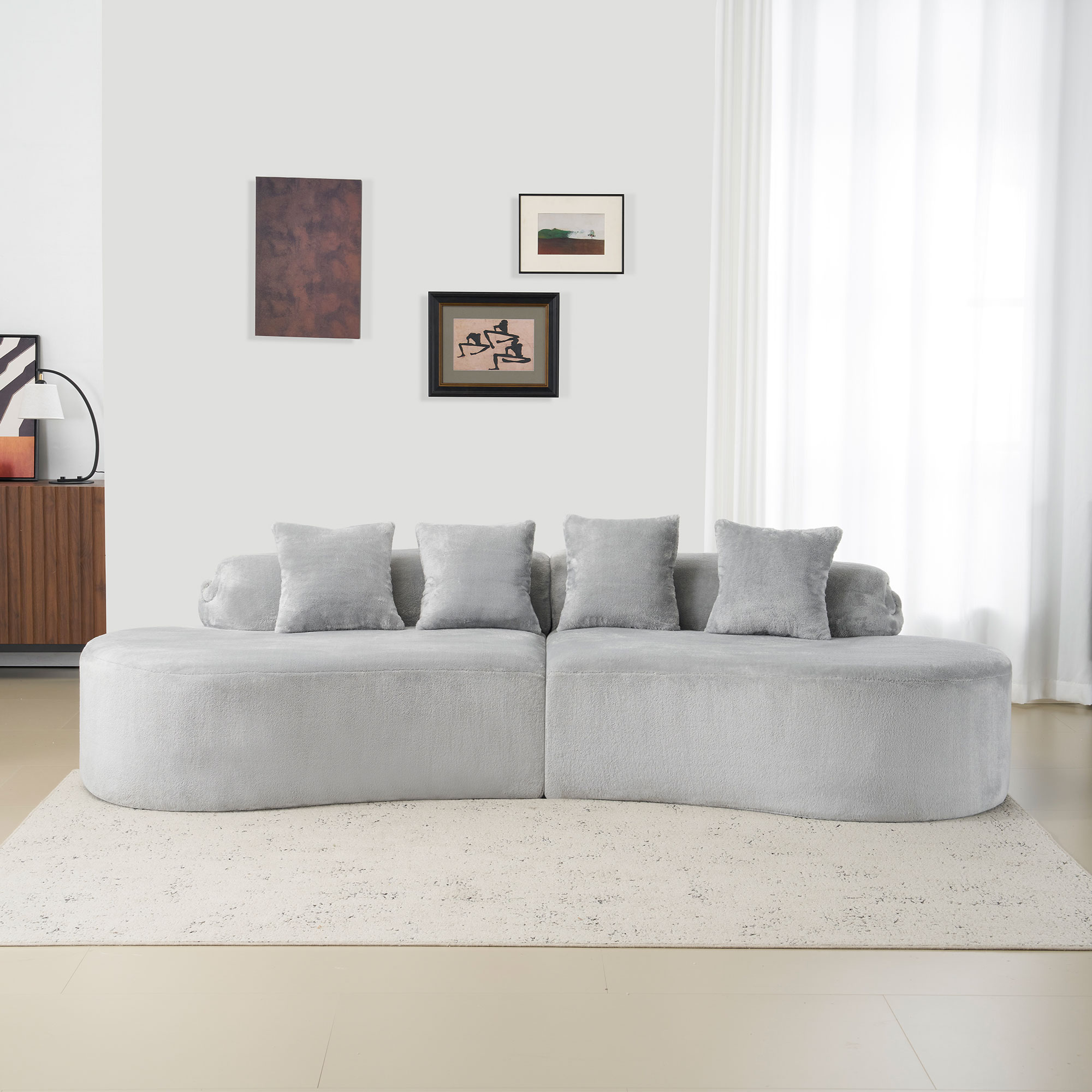 Modern and simple curved flannelette sofa. Creative multi-seater in light gray for the living room, with a combination of pillows.